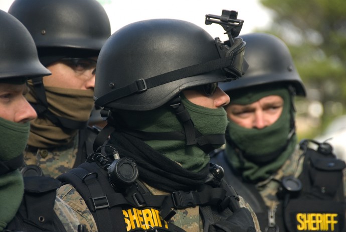 Police departments across the country are adopting many of the tactics and equiptment more commonly associated with organized military untis. (Photo by the Oregon DOT)