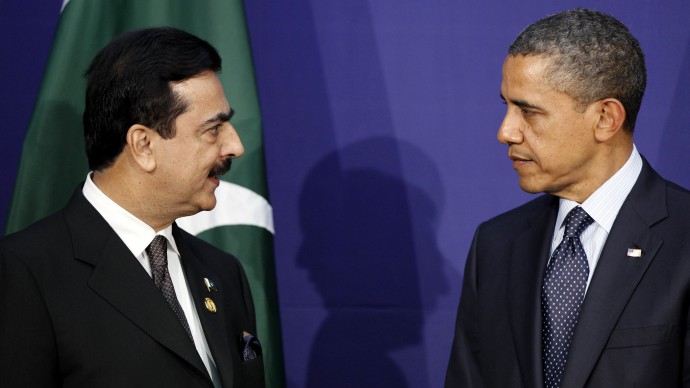 Pakistani Prime Minister Syed Yusuf Raza Gilani, left, speaks to U.S. President Barack Obama during their bilateral meeting on the sidelines of the Nuclear Security Summit in Seoul, South Korea, Tuesday, March 27, 2012. (AP Photo/Pablo Martinez Monsivais)