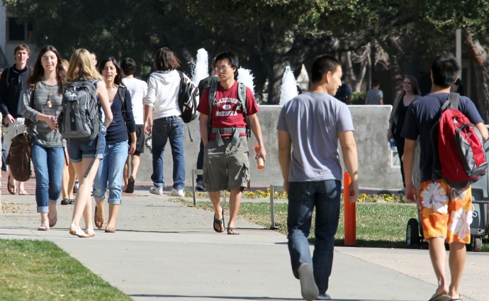 In this Thursday, Feb. 2, 2012 photo, students walk through the campus of Claremont McKenna College in Claremont, Calif. (AP Photo/Reed Saxon)