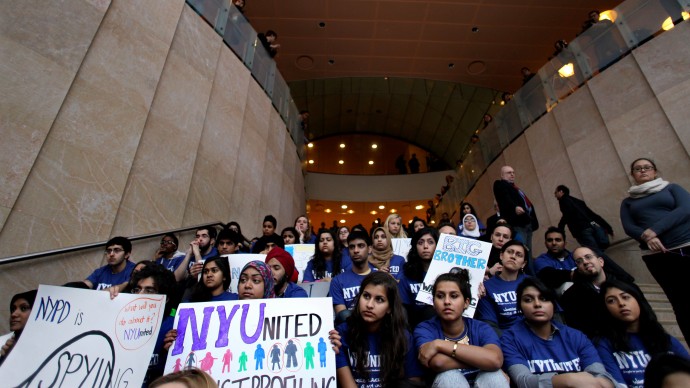 In this file photo of Feb. 29, 2012,  New York University students, faculty and clergy gather on the NYU campus to discuss the discovery of surveillance by the New York Police Department on Muslim communities. (AP Photo/Craig Ruttle, File)