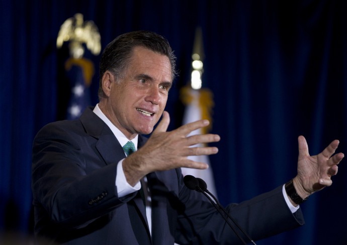 In this March 26, 2012, photo, Republican presidential candidate, former Massachusetts Gov. Mitt Romney gestures while speaking at NuVasive, Inc., a medical device company, in San Diego, Calif. Romney edged into the mop-up phase of the race for the Republican presidential nomination on Wednesday, March 28, 2012, buoyed by Newt Gingrich's decision to scale back his campaign to the vanishing point and Rick Santorum's statement that he would take the No. 2 spot on the party ticket in the fall. (AP Photo/Steven Senne)