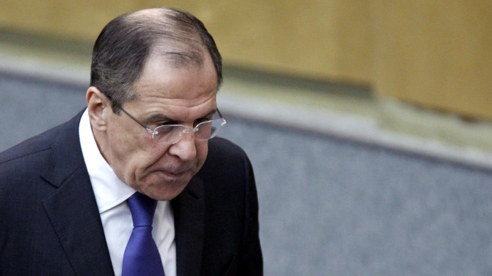 Russian Foreign Minister Sergey Lavrov walks at the State Duma, the lower parliament chamber, Moscow, Russia, Wednesday, March 14, 2012. Lavrov says Moscow is providing Syria with weapons to fend off external threats but has no intention to use military force to protect Syrian President Bashar Assad. (AP Photo/Misha Japaridze)