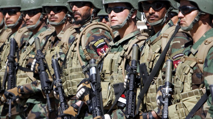 Afghan special forces stand in formation during their graduation ceremony at a military training center on outskirts of Kabul, Afghanistan, Thursday, April 5, 2012. The process of taking over security from around 100,000 NATO-led ISAF forces by Afghan troops should be completed by the end of 2014, when Afghanistan army will take over the full leadership of its own security duties from U.S. and NATO forces. (AP Photo/Musadeq Sadeq)