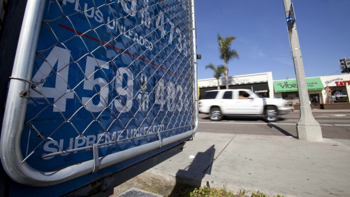 A sign displays gas prices at a gas station Friday, Feb. 17, 2012, in San Diego. Some analysts are starting to worry that rising fuel costs will undermine consumer spending and stymie economic growth. (AP Photo/Gregory Bull)