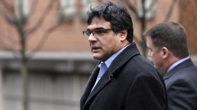 Former CIA officer John Kiriakou, left, and his attorney John Hundley, leave federal court  in Alexandria, Va., Monday, Jan. 23, 2012. In the latest criminal case in the Obama administration's effort to punish leakers, Kiriakou, who helped track down and capture a top terror suspect was charged with disclosing classified secrets about his teammates to the media. (AP Photo/Jacquelyn Martin)