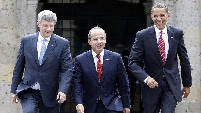 FILE - In this Aug. 10, 2009, file photo, President Barack Obama, right, Mexico's President Felipe Calderon, center, and Canada's Prime Minister Stephen Harper walk towards a stand for an official photo in Guadalajara, Mexico, for a North American summit.  (AP Photo/Alex Brandon, File)