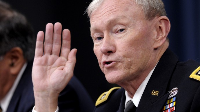 In this photo taken, Thursday, May 10, 2012, Joint Chiefs Chairman Gen. Martin E. Dempsey speaks during a briefing at the Pentagon. A course for U.S. military officers was teaching that America is at war with Muslims, suggesting the U.S. ultimately may have to wipe out Islamic holy cities like Mecca and Medina just as it destroyed Hiroshima in World War II. That teaching is counter to repeated assertions by U.S. officials over the last decade that the U.S. is at war against terrorists who distort Islam _ not against the religion itself. The Defense Department suspended the course at the Joint Forces Staff College last month due to the inflammatory materials, but details of what was taught were first revealed Thursday. Dempsey called the material objectionable, irresponsible and against American values on freedom of religion. (AP Photo/Susan Walsh)