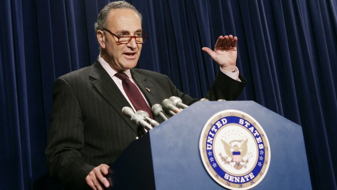Sen. Charles Schumer, D-N.Y., gestures during a Capitol Hill news conference  Tuesday, June, 13, 2006. Schumer recently proposed legislation that would tax U.S. expatriates. (AP Photo/Evan Vucci)
