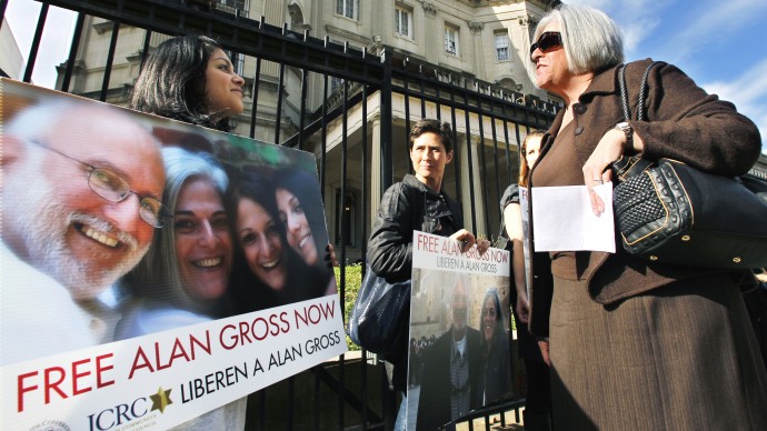 Judy Gross, wife of Alan Gross, an American imprisoned in Cuba, right, talks to Nirma Medrano, left, during a rally to support her husband, Monday, Nov. 28, 2011, outside the Cuban Interests Section in Washington.   (AP Photo/Manuel Balce Ceneta)