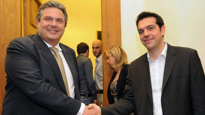 Greek leader of Coalition of the Radical Left party, SYRIZA, Alexis Tsipras, right, and leader of the right wing party of 'Independent Greeks' smile as they shake hands before their meeting at the Greek Parliament in Athens, Wednesday, May 9, 2012. (AP Photo/Evi Fylaktou)