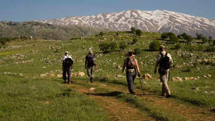 Hiking along the Lebanon Mountain Trail in the Beqaa Valley below a snow-capped Mt. Hermon rising up in the distance. (Photo Norbert Schiller)