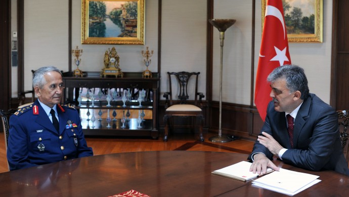 In this photo released by the Turkish Presidency Press Office, Turkish President Abdullah Gul, right, meets with Gen. Mehmet Erten, Commander of the Turkish Air Force, in Istanbul Turkey, Monday, June 25, 2012. Upon Turkey's request, NATO will hold a meeting Tuesday in Brussels over article 4 of its charter concerning Friday's incident, when a Turkish warplane was shot down by Syria. (AP Photo/Mustafa Oztartan, Turkish Presidency Press Office, HO)
