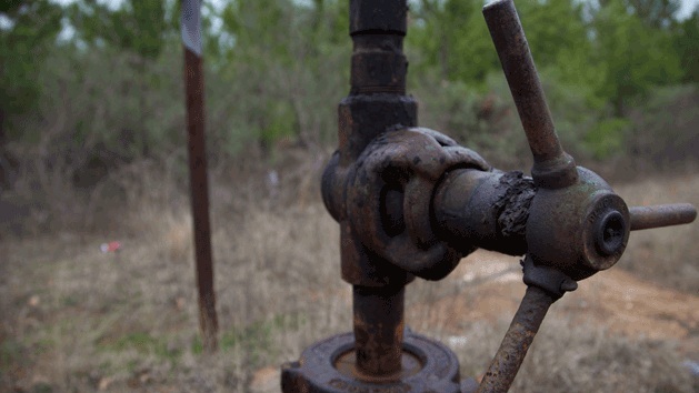 A class 2 brine disposal well in western Louisiana near the Texas border. The well sat by the side of the road, without restricted access. (Abrahm Lustgarten/ProPublica)