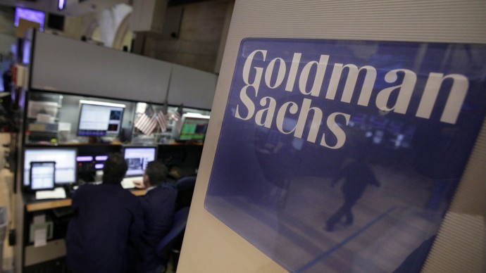 Traders work in the Goldman Sachs booth on the floor of the New York Stock Exchange Thursday, March 15, 2012. (AP Photo/Richard Drew)