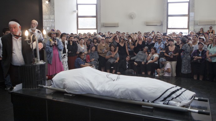 Family and friends attend the funeral of Itzik Kolengi, 28, who was killed and his wife injured in a suicide bombing in Bulgaria Wednesday in Petah Tikva, Israel, Friday, July 20, 2012. (AP Photo/Dan Balilty)