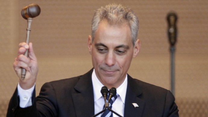 With gavel in hand for the first time Chicago Mayor Rahm Emanuel ejourns the first meeting of the new city council after iaugaration ceremonies, Monday, May 16, 2011, in Chicago. (AP Photo/M. Spencer Green)