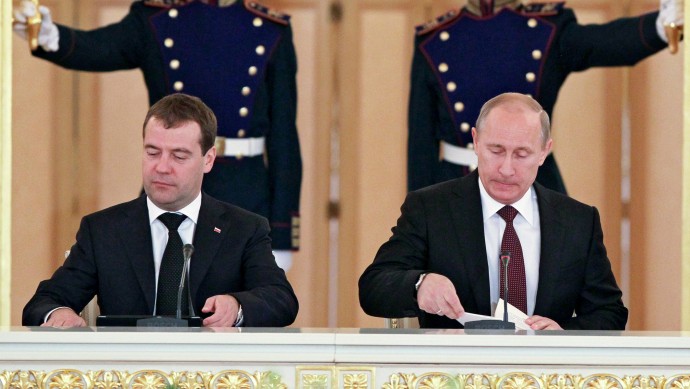 Russian President Vladimir Putin, right, heads a State Council session alongside Russian Prime Minister Dmitry Medvedev in the Kremlin, Moscow, Russia, Tuesday, July 17, 2012. (AP Photo/RIA Novosti, Yekaterina Shtukina, Government Press service)