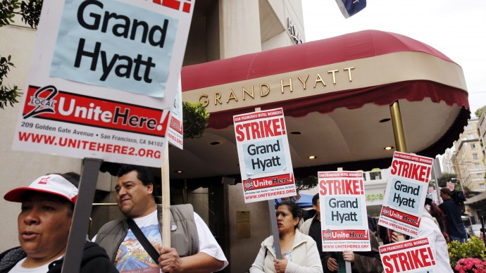 Grand Hyatt workers and supporters strike outside of the Grand Hyatt in the Union Square area of downtown San Francisco, Thursday, Nov. 5, 2009. (AP Photo/Paul Sakuma)