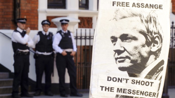 A pro-Julian Assange placard is seen outside the Embassy of Ecuador, in central London, Saturday August 18, 2012, where Wikileaks founder Julian Assange is claiming asylum in an effort to avoid extradition to Sweden. (AP Photo / Dominic Lipinski/PA)
