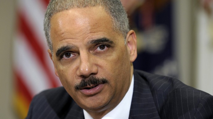 In this July 26, 2012 file photo, Attorney General Eric Holder speaks in the Cabinet Room of the White House in Washington. (AP Photo/Susan Walsh, File)