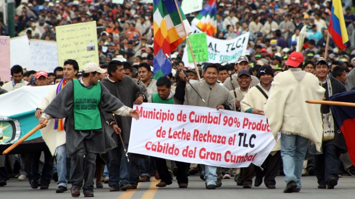 Indigenous protesters march against the Free Trade Agreement between Colombia and the U.S. in Ipiales, on Colombia's southern border with Ecuador, Wednesday March 9, 2011. (AP Photo/Wilson Prado)