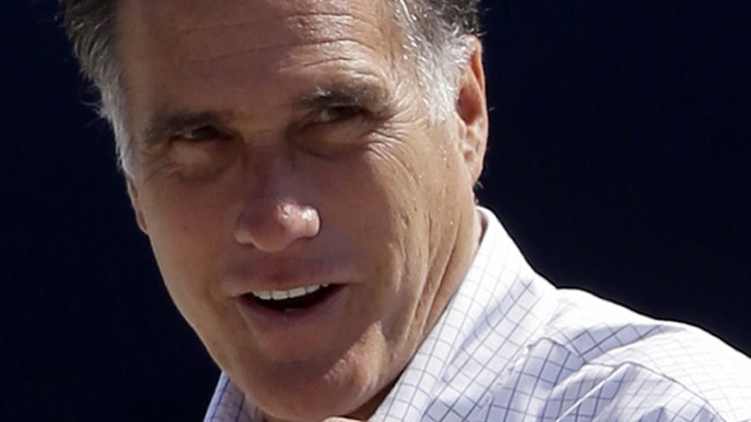 In this Sept. 23, 2012 file photo, Republican presidential candidate, former Massachusetts Gov. Mitt Romney gets ready to board his campaign plane in Los Angeles. (AP Photo/Charles Dharapak, File)