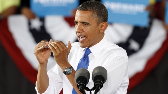 President Barack Obama gestures during a rally in Virginia Beach, Va., Thursday, Sept. 27, 2012. (AP Photo/Steve Helber)