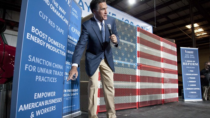 In this Sept. 6, 2011, file photo Republican presidential candidate Gov. Mitt Romney talks about his plan for creating jobs and improving the economy at McCandless International Trucks in Las Vegas. (AP Photo/Julie Jacobson, File)