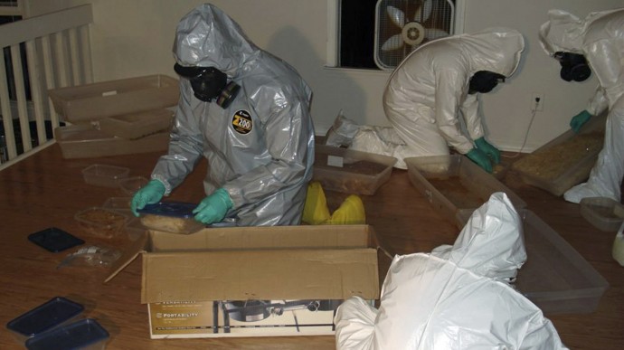 In this Nov. 29, 2010 file photo, Gwinnett County, Ga., police confiscate methamphetamine at a home they raided in Norcross, Ga., after being tipped meth was being produced there. (AP Photo/Gwinnett County, Ga., Police Department, File)