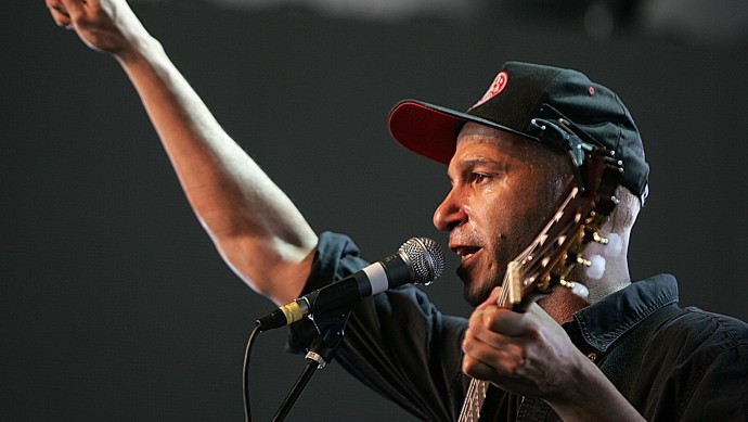Tom Morello performs as The Nightwatchman, the Rage Against the Machine and Audioslave guitarist's alter-ego and solo act, at the Coachella Valley Music and Arts Festival in Indio, Calif., on Saturday, April 28, 2007. (AP Photo/Branimir Kvartuc)