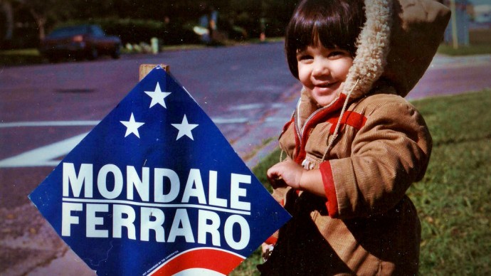 A little girl stands in front of a political sign for Walter Mondale on Nov. 6, 1984. (Photo by Paul Lowry via Flikr)