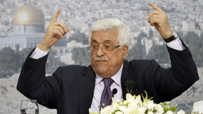 Palestinian President Mahmoud Abbas gestures during a press conference in the West Bank city of Ramallah, Saturday , Sept. 8, 2012. (AP Photo/Nasser Shiyoukhi)