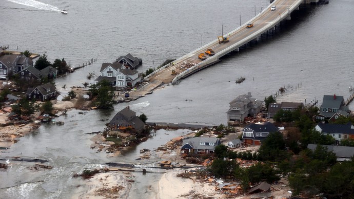 The view of storm damage over the Atlantic Coast in Seaside Heights, N.J.,  Wednesday, Oct. 31, 2012, from a helicopter traveling behind the helicopter carrying President Obama and New Jersey Gov. Chris Christie, as they viewed storm damage from superstorm Sandy.   (AP Photo/Doug Mills, Pool)