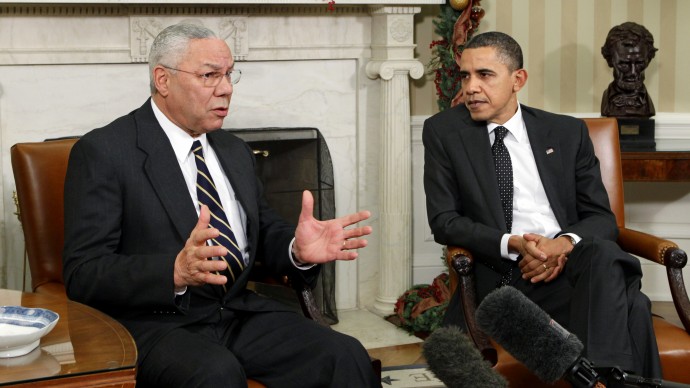 In this Dec. 1, 2010 file photo, former Secretary of State Colin Powell meets with President Barack Obama, in the Oval Office at the White in Washington. Powell, a longtime Republican said on the "CBS This Morning" program Thursday, he is sticking with President Barack Obama in this year's election. (AP Photo/J. Scott Applewhite, File)