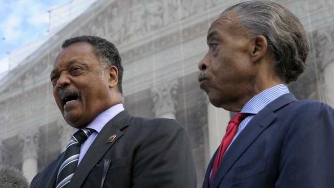 Rev. Jesse Jackson, left, and Rev. Al Sharpton, right, speak to reporters outside the Supreme Court in Washington, Wednesday, Oct. 10, 2012. The Supreme Court is taking up a challenge to a University of Texas program that considers race in some college admissions. The case could produce new limits on affirmative action at universities, or roll it back entirely. (AP Photo/Susan Walsh)