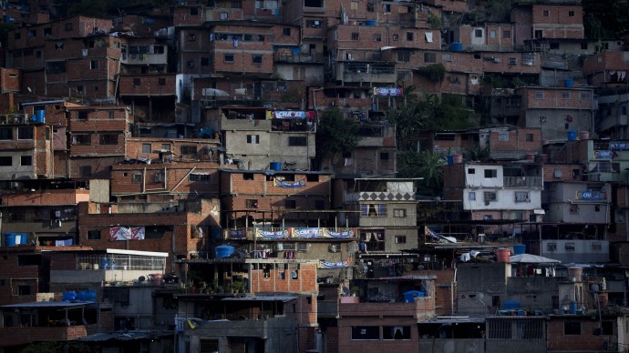 This Sept. 4, 2012 photo shows the Petare neighborhood of Caracas, Venezuela. (AP Photo/Ariana Cubillos)