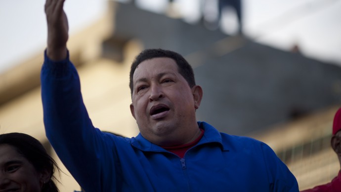 Venezuela's President Hugo Chavez waves to supporters during a campaign rally in Barquisimeto, Venezuela, Tuesday, Oct. 2, 2012. (AP Photo/Rodrigo Abd)