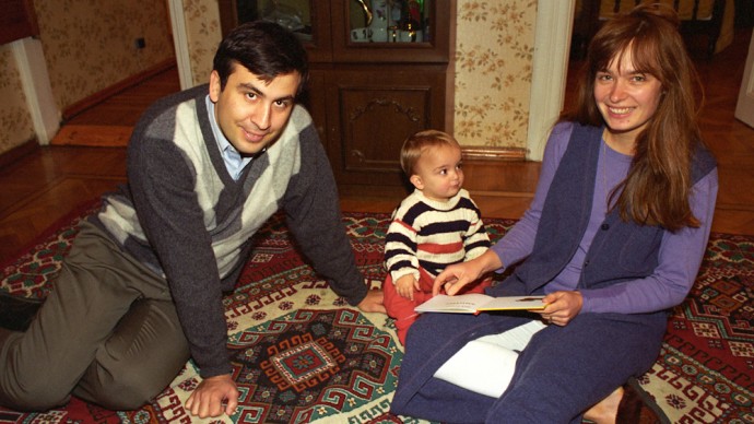 The young Georgian MP Mikheil Saakashvili  with his Dutch wife, Sandra, and 1-year-old son, Eduard, at their home in Tbilisi in the mid 1990s. (Photo Norbert Schiller/MintPress News)