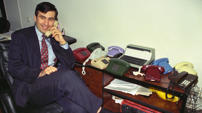 The young Georgian MP Mikheil Saakashvili speaking on one of his nearly a dozen telephones. (Photo Norbert Schiller/MintPress News)