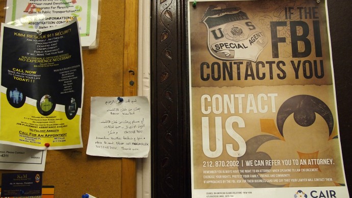 Flyers are posted on a wall outside of the prayer room at the Islamic Culture Center in Newark, N.J., Wednesday, Feb. 15, 2012. (AP Photo/Charles Dharapak)