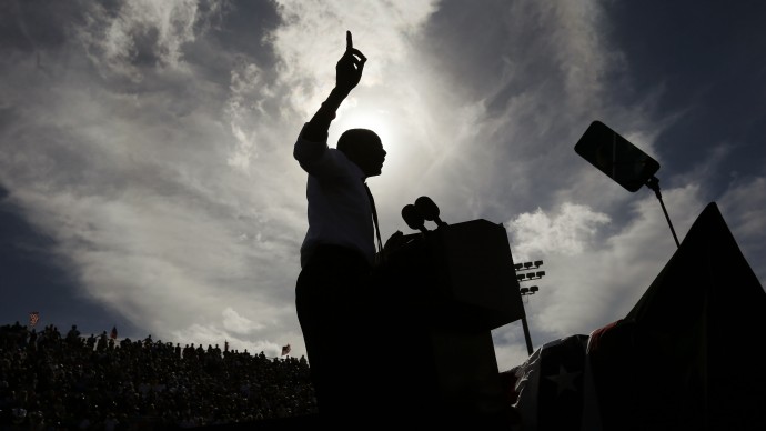 A silhouetted President Barack Obama gestures while speaking at a 2012 campaign event on Oct. 23, 2012 in Delray Beach, Fla., the day after the last presidential debate against Republican Presidential candidate, former Massachusetts Gov. Mitt Romney. (AP Photo/Pablo Martinez Monsivais)