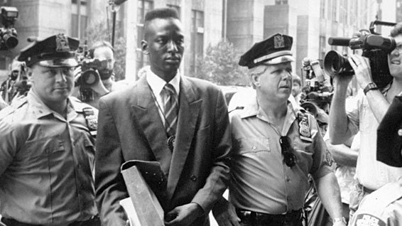 This film image released by Sundance Selects shows accused rapist Yusef Salaam being escorted by police in New York in 1990. (AP Photo/Sundance Selects, NY Daily News)