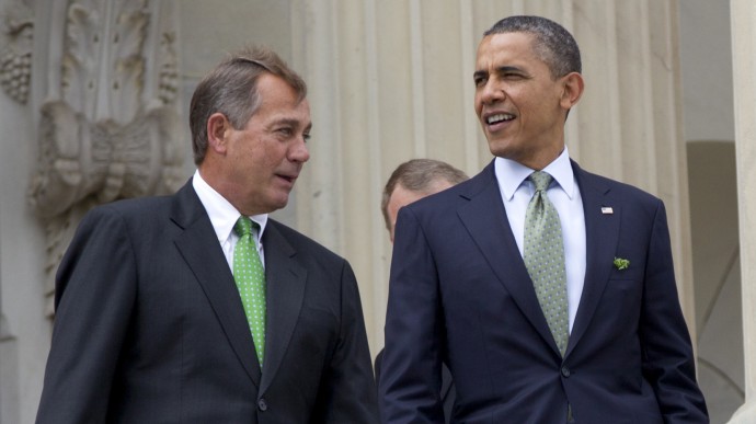 This March 20, 2012 file photo shows House Speaker John Boehner of Ohio and President Barack Obama walk down the steps of the Capitol in Washington. (AP Photo/Carolyn Kaster, File)