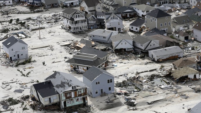 This Oct. 31, 2012 file photo shows the destroyed homes left in the wake of superstorm Sandy in Seaside Heights, N.J. (AP Photo/Mike Groll, file)