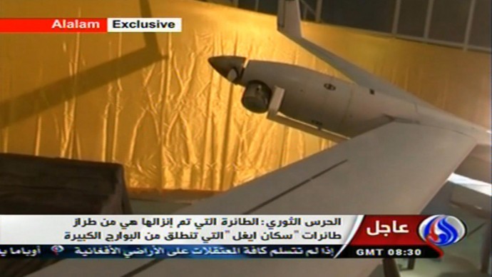In this image taken from the Iranian state TV's Arabic-language channel Al-Alam, showed what they purport to be an intact ScanEagle drone aircraft put on display, as an exclusive broadcast Tuesday Dec. 4, 2012, showing what they say are the first pictures of the captured drone. (AP Photo / Al-Alam TV)
