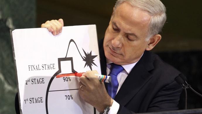 In this Thursday, Sept. 27, 2012 file photo, Israeli Prime Minister Benjamin Netanyahu uses a red marker as he on a diagram of a bomb as he describes his concerns over Iran's nuclear ambitions during his address to the 67th session of the United Nations General Assembly at U.N. headquarters. (AP Photo/Seth Wenig)