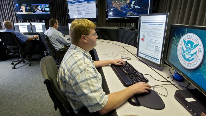 In this Sept. 29, 2011 file photo, a cyber security analyst works in the "watch and warning center" during the first tour of the government's secretive cyber defense lab in Idaho Falls, Idaho. (AP Photo/Mark J. Terrill, File)