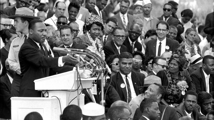 In this Aug. 28, 1963 file photo, the Rev. Dr. Martin Luther King Jr., head of the Southern Christian Leadership Conference, speaks to thousands during his "I Have a Dream" speech in front of the Lincoln Memorial for the March on Washington for Jobs and Freedom, in Washington. Actor-singer Sammy Davis Jr., is at bottom right.(AP Photo/File)