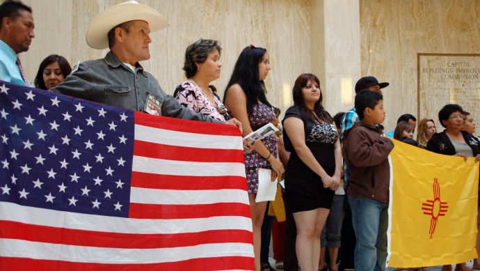 This Sept. 6, 2011 file photo shows protestors during a news conference organized by immigrant advocates at the Capitol in Santa Fe, N.M. (AP Photo/Russell Contreras, File)